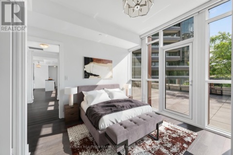 Primary bedroom with terrace access and ensuite